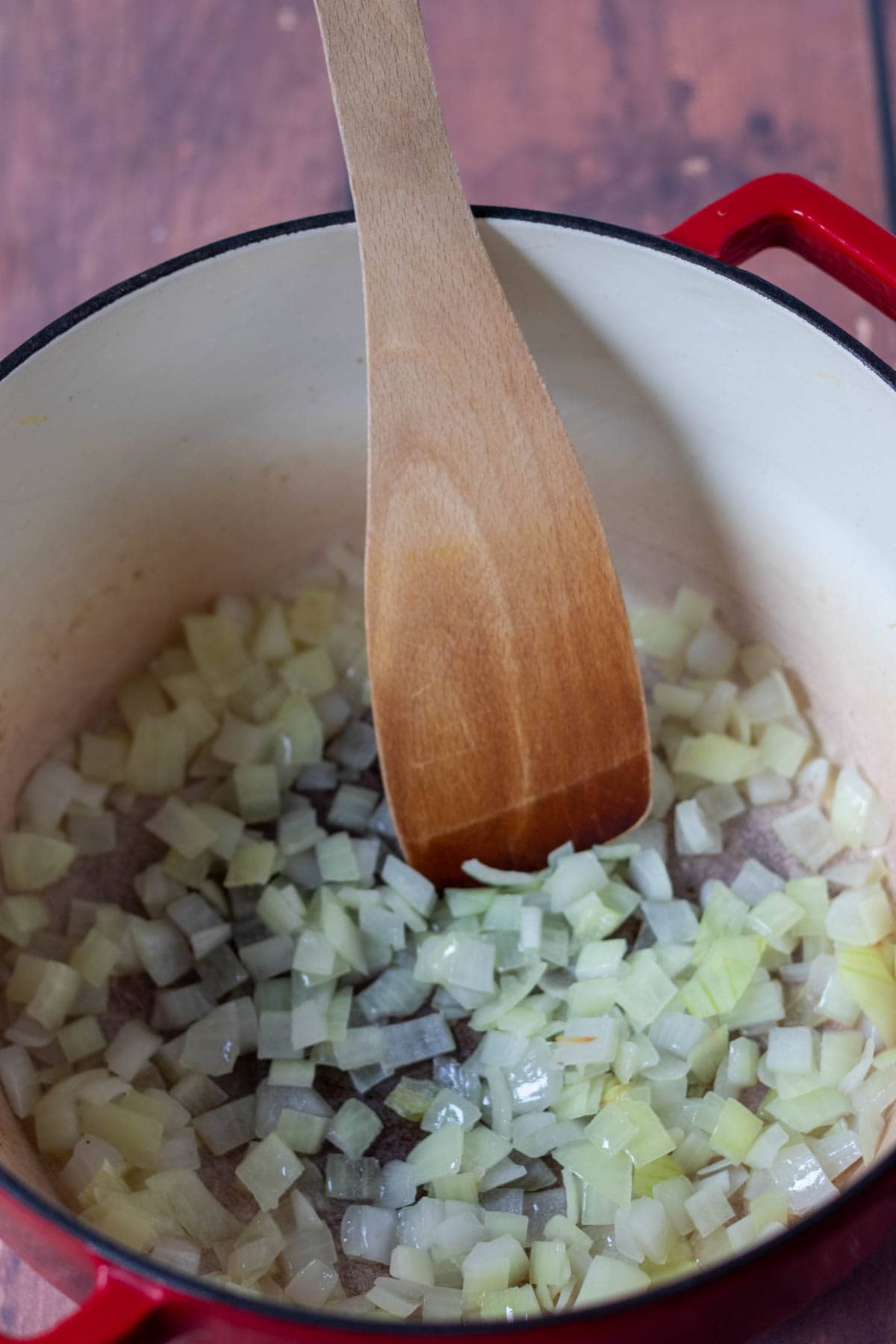 Onion sautéd in a large pan.