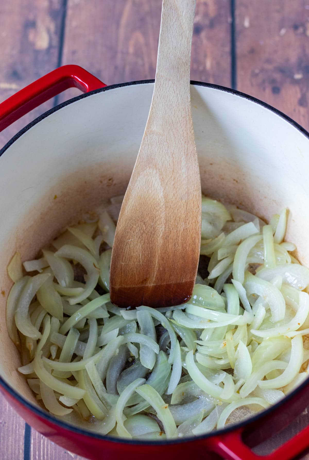Garlic and onion sautéd in a large casserole pot.