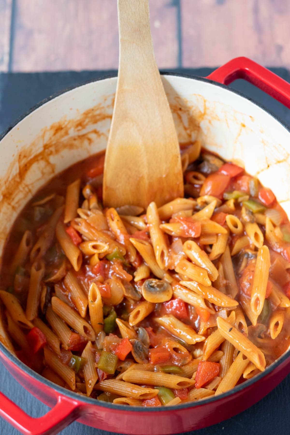 Booked veggie pasta in a large casserole pot.