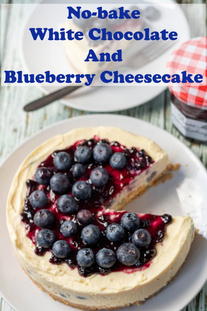 No-bake white chocolate and blueberry cheesecake with a slice removed. Pin title text overlay at top.