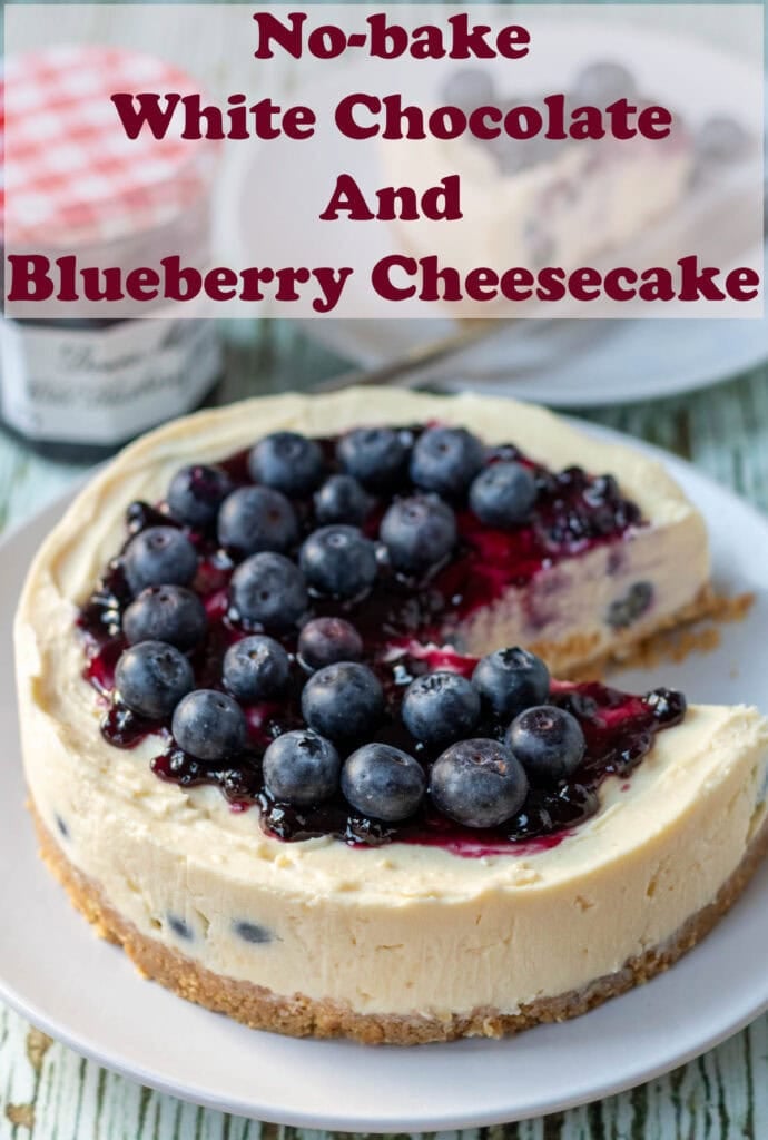 No-bake white chocolate and blueberry cheesecake on a plate with a slice removed. Pin title text overlay at top.