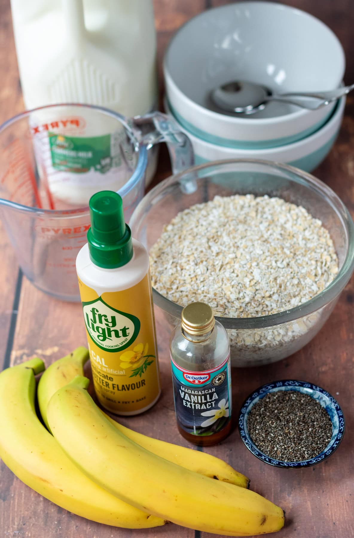 Slow cooker banana porridge ingredients laid out on a table.