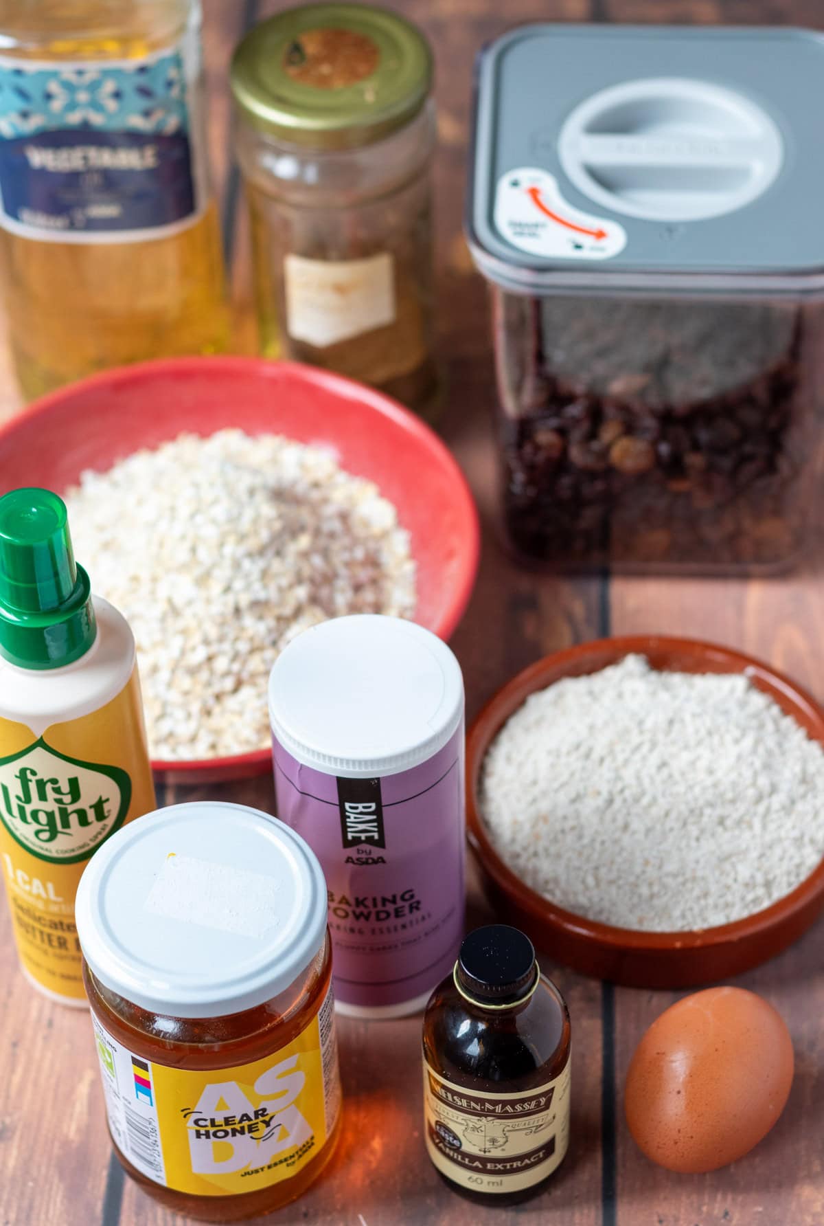 Raisin oat cookies ingredients laid out on a table.