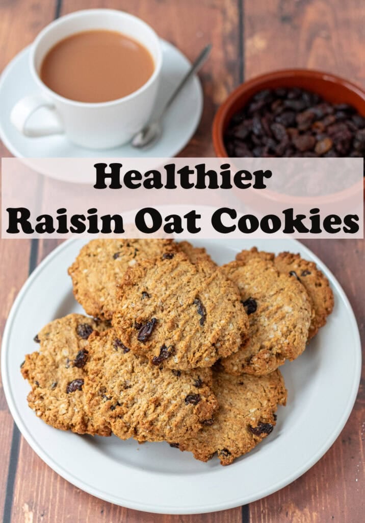 A plate of raisin oat cookies. At top a cup of tea and a dish of raisins. Pin title text overlay in between.