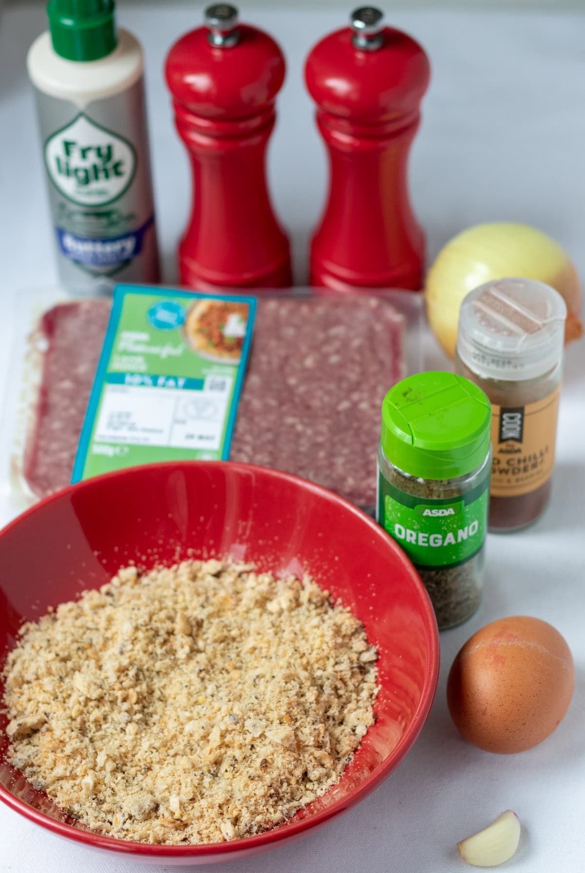 Easy simple lamb burgers recipe ingredients laid out on a table.