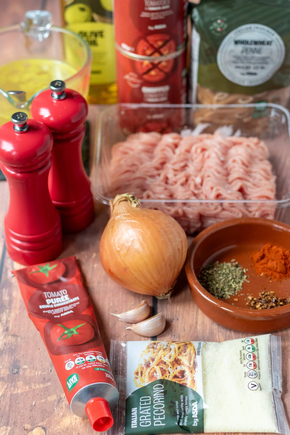 One pot turkey mince pasta ingredients laid out on a table.