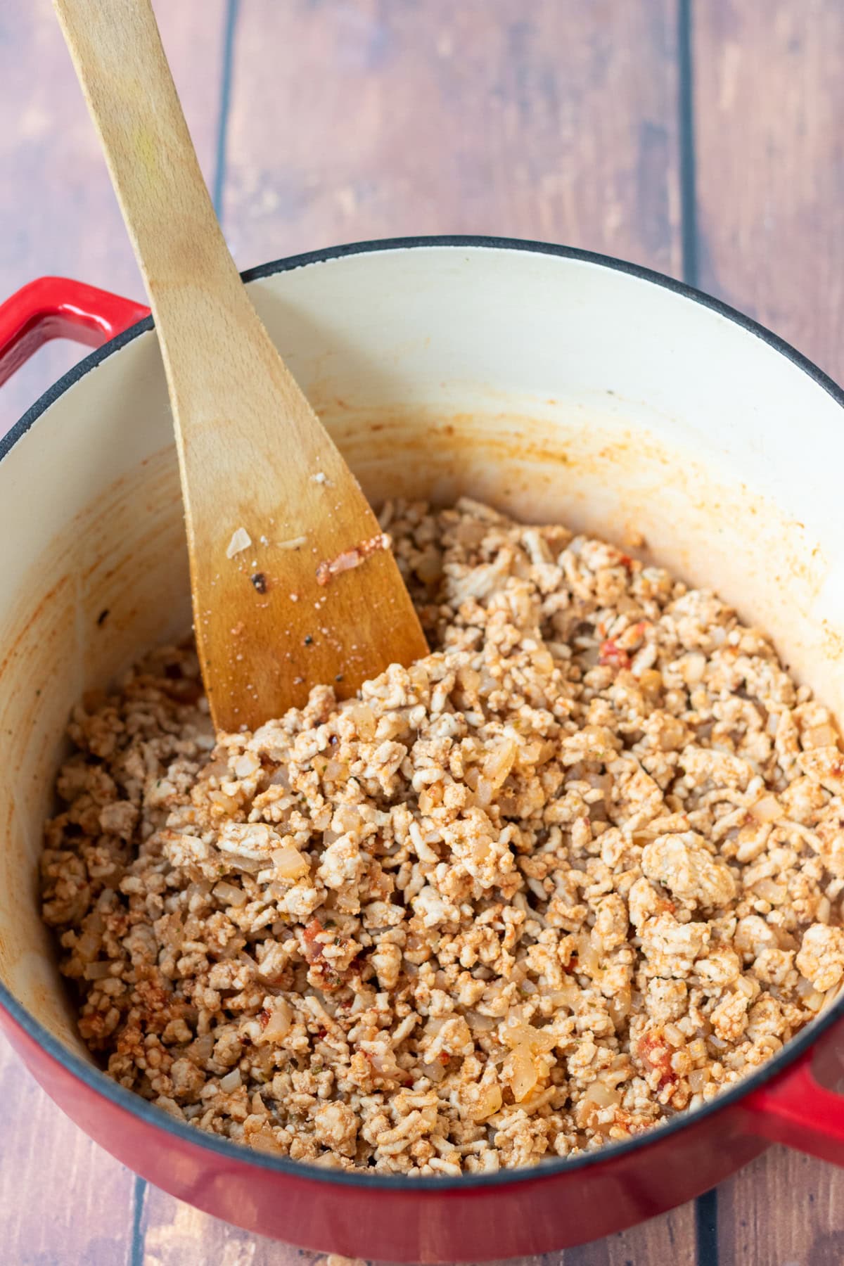 Mixed herbs, smoked paprika, chilli flakes and tomato purée stirred into the turkey mince pasta recipe.